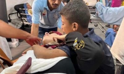 A "dead man" holding a cell phone. Credit: Inbar Cohen FB page.