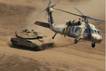 IDF Tank and helicopter. Credit: Nitsan Saddan