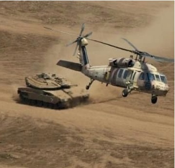IDF Tank and helicopter. Credit: Nitsan Saddan