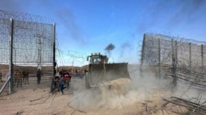 Palestinian tractor breaking through the border. Credit: Oz Koren’s FB page.