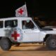 Red Cross vehicle driving Israeli hostages to the Israeli border, when being released. credit: Shay Saig’s FB page.